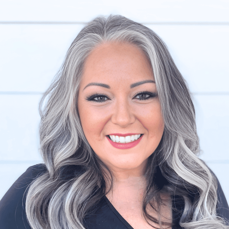 Portrait of Lisa Yost, a professional stylist at Ashlyn Jamyson Salon & Spa, showcasing their expertise and style.