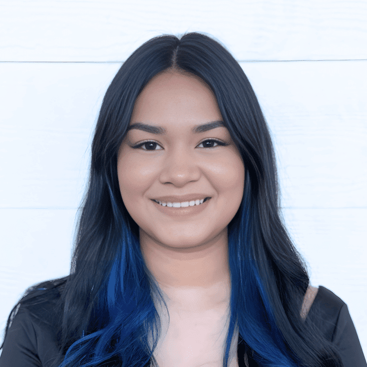 Portrait of Jasslin Valasquev, a professional stylist at Ashlyn Jamyson Salon & Spa, showcasing their expertise and style.