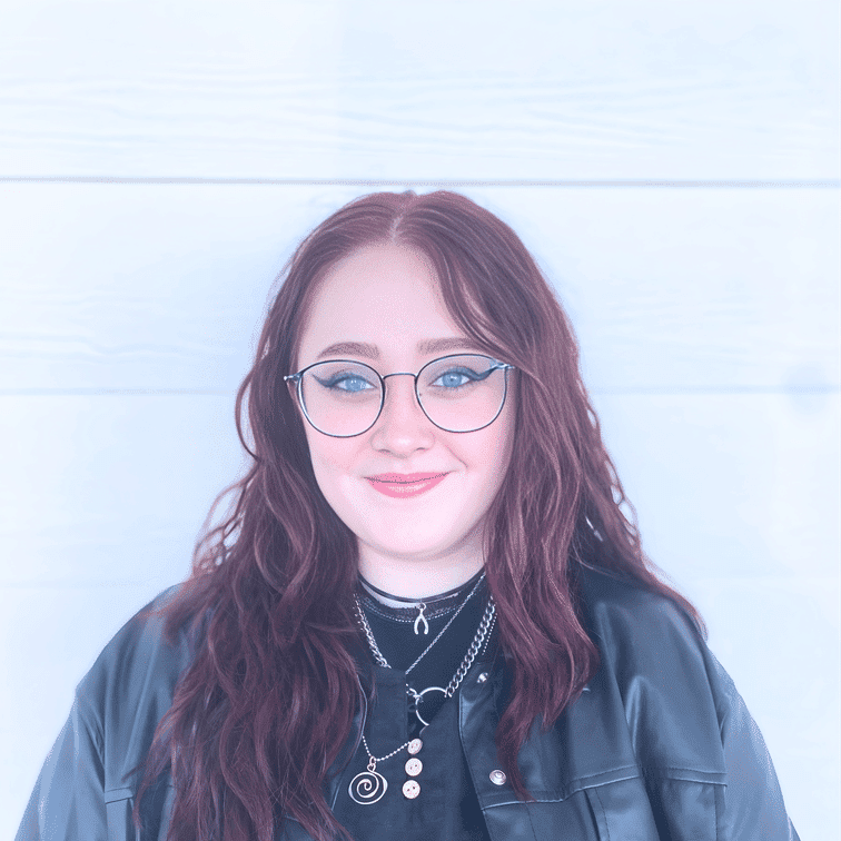 Portrait of Brielle Beecher, a professional stylist at Ashlyn Jamyson Salon & Spa, showcasing their expertise and style.