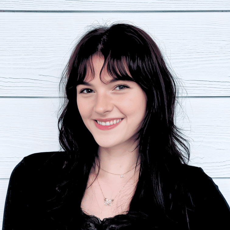 Portrait of Taylor Miller, a professional stylist at Ashlyn Jamyson Salon & Spa, showcasing their expertise and style.