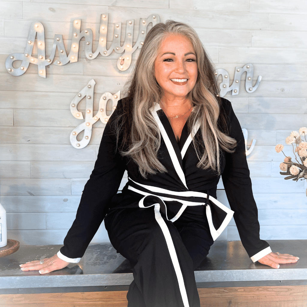 Portrait of Lisa Yost, a professional stylist at Ashlyn Jamyson Salon & Spa, showcasing their expertise and style.