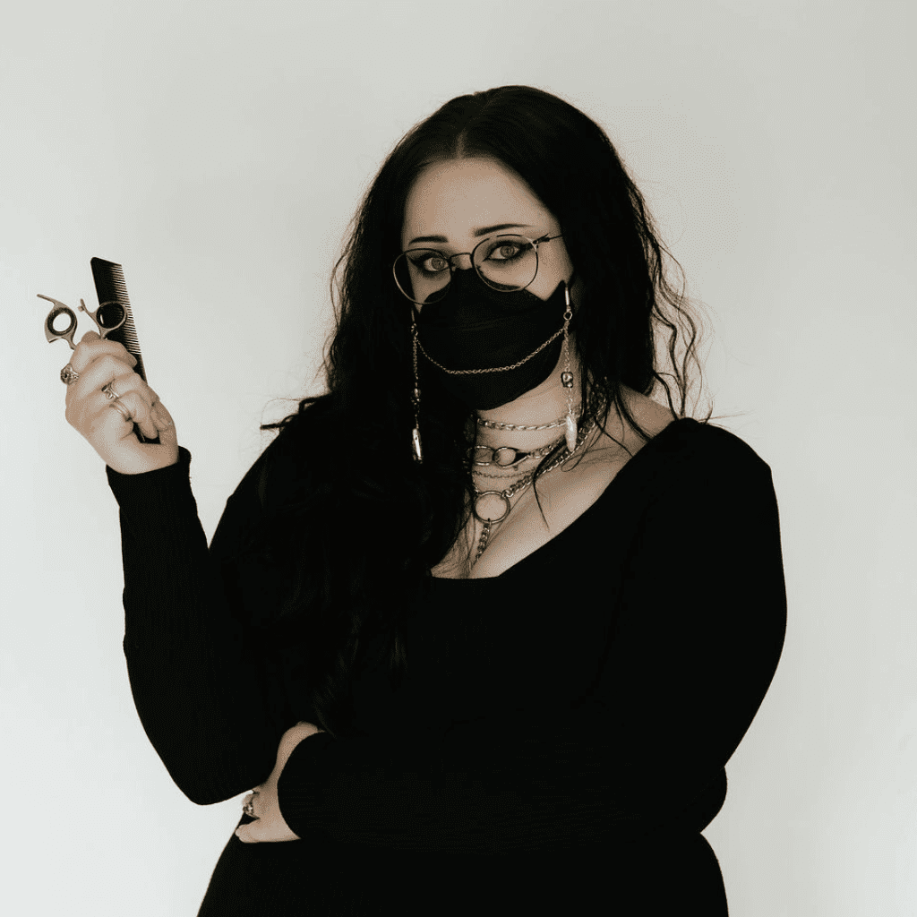 Portrait of Brielle Beecher, a professional stylist at Ashlyn Jamyson Salon & Spa, showcasing their expertise and style.