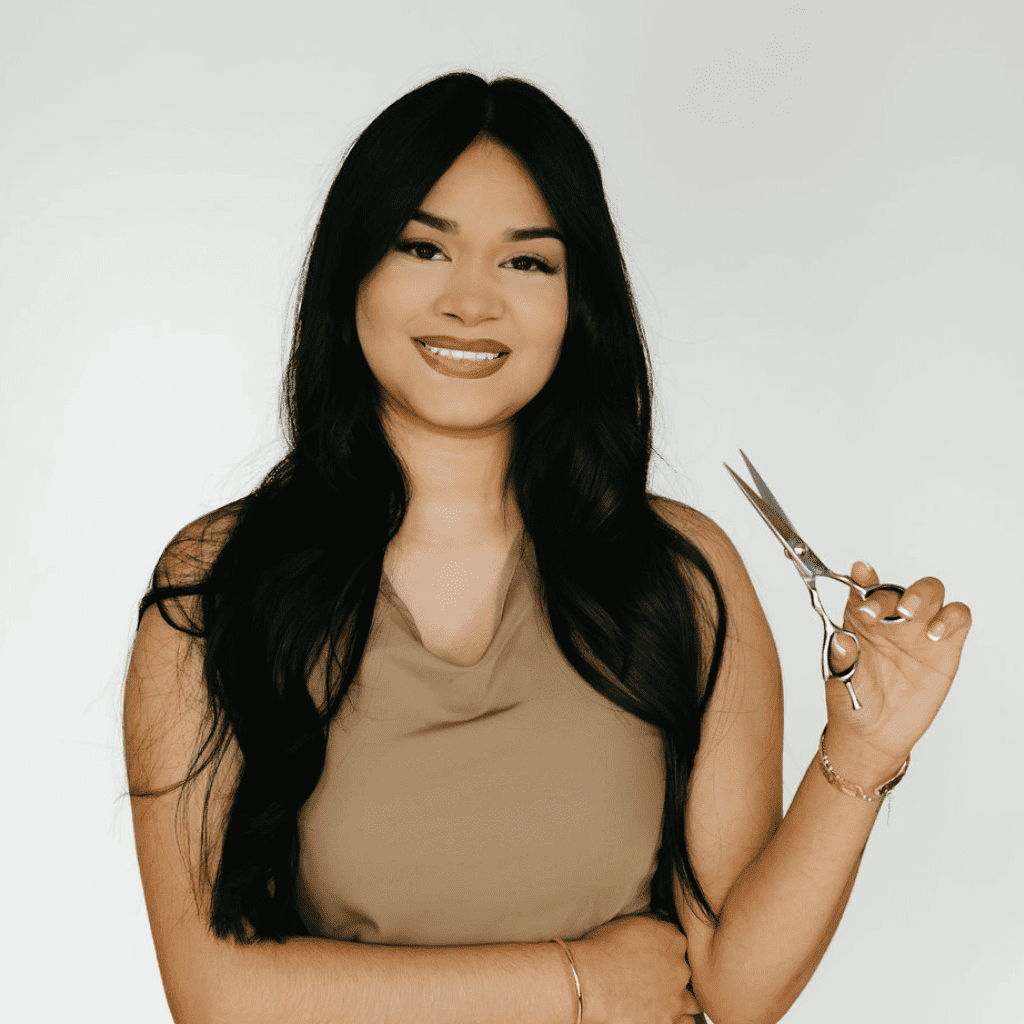 Portrait of Jasslin Valasquev, a professional stylist at Ashlyn Jamyson Salon & Spa, showcasing their expertise and style.