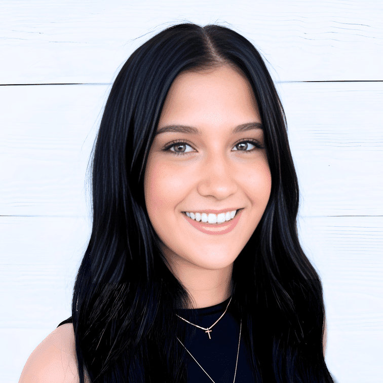 Portrait of Lilly Bauer, a professional stylist at Ashlyn Jamyson Salon & Spa, showcasing their expertise and style.